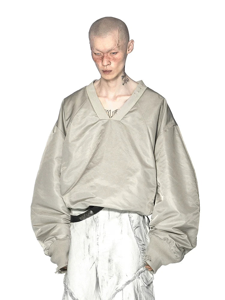 DEFORMED V-NECK TOP
