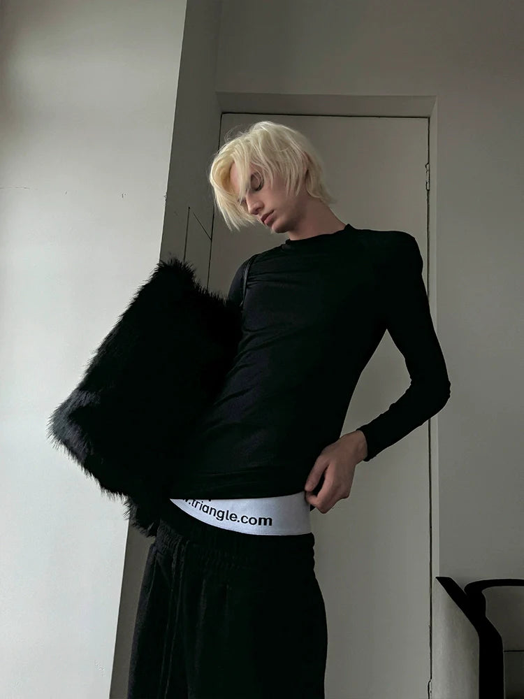 OVERSIZED SHOULDER PAD TOP