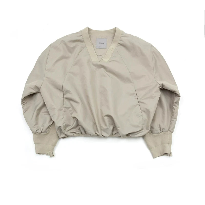 DEFORMED V-NECK TOP
