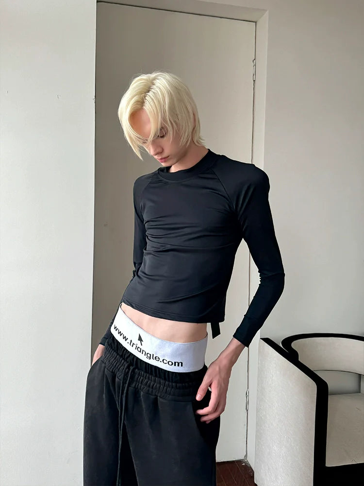 OVERSIZED SHOULDER PAD TOP