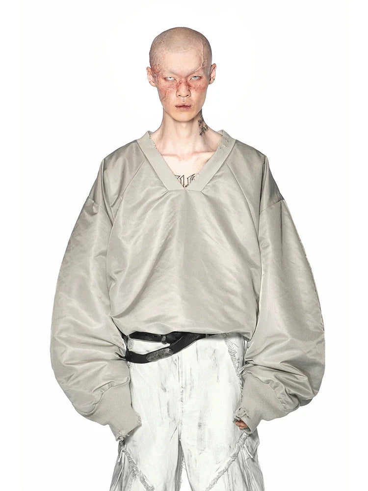 DEFORMED V-NECK TOP