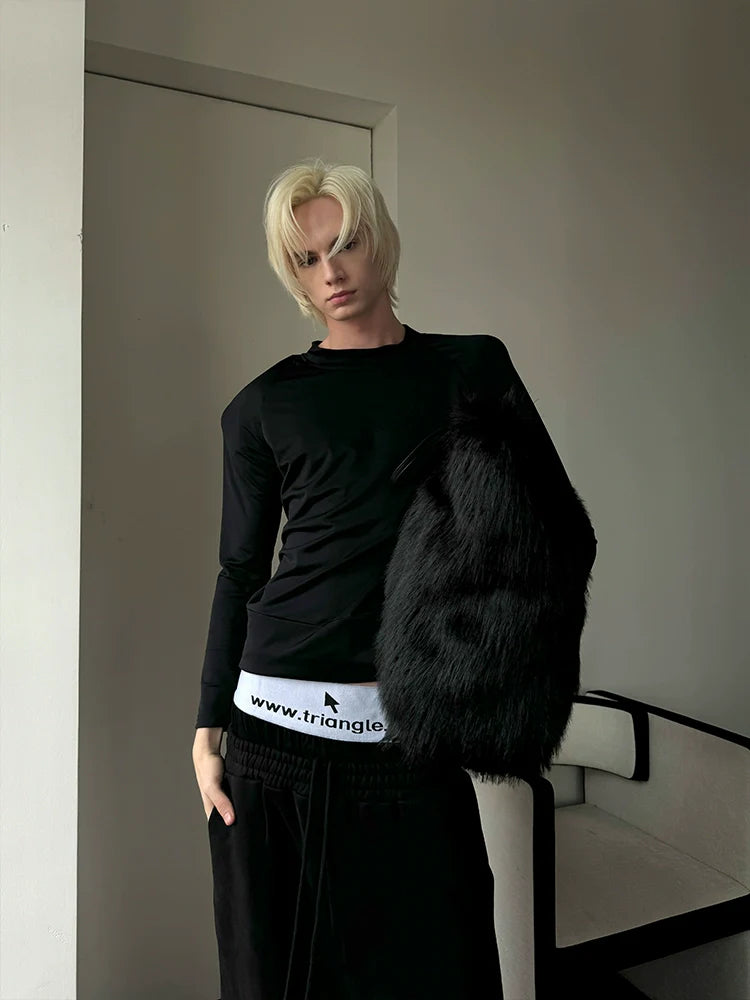 OVERSIZED SHOULDER PAD TOP