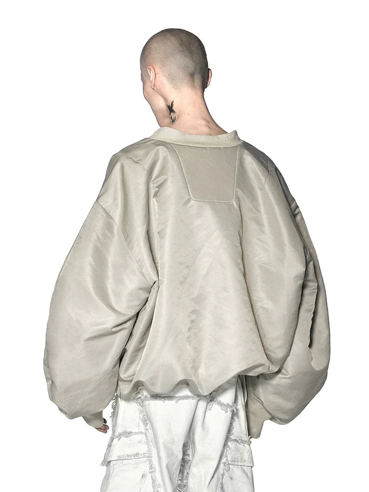 DEFORMED V-NECK TOP