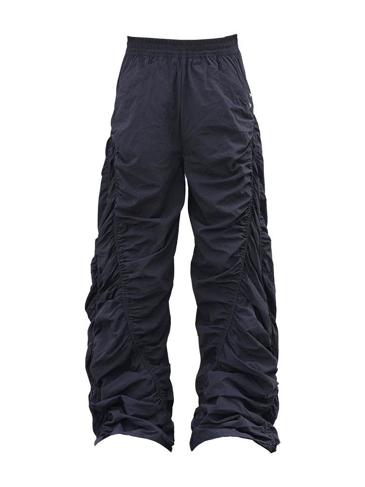 PLEATED SPIRAL CUT PANTS