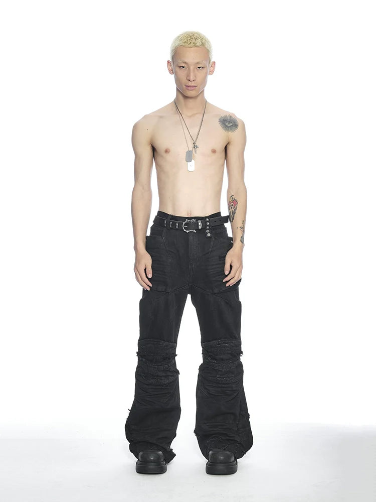 DISTRESSED WAXED DENIM PANTS
