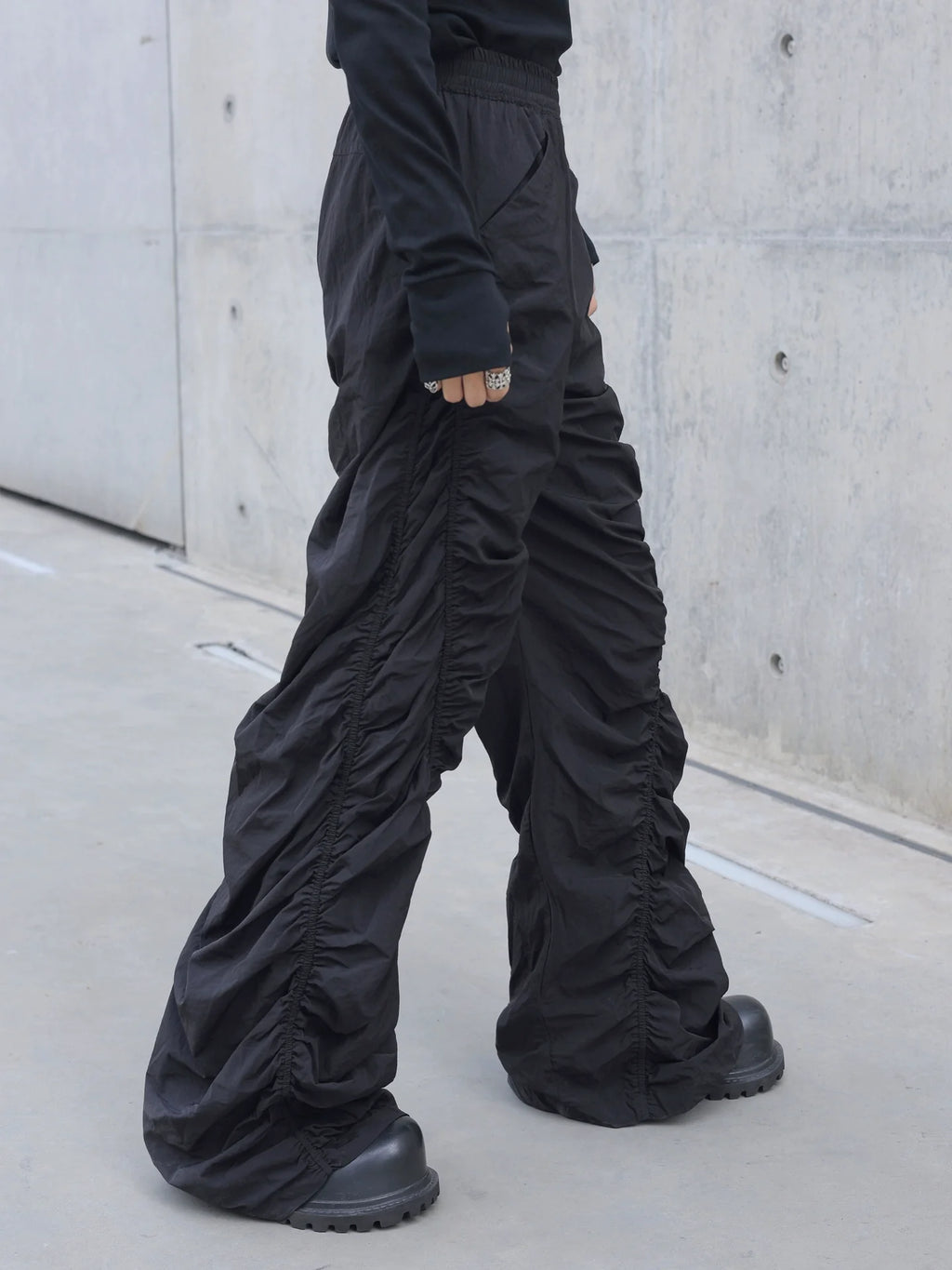 PLEATED SPIRAL CUT PANTS