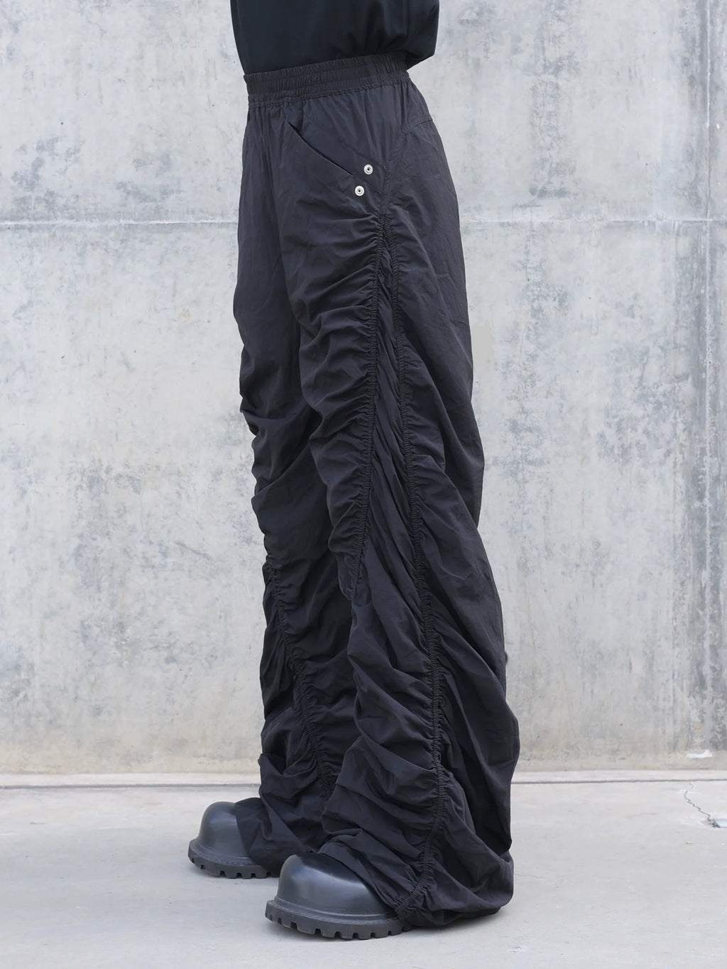 PLEATED SPIRAL CUT PANTS