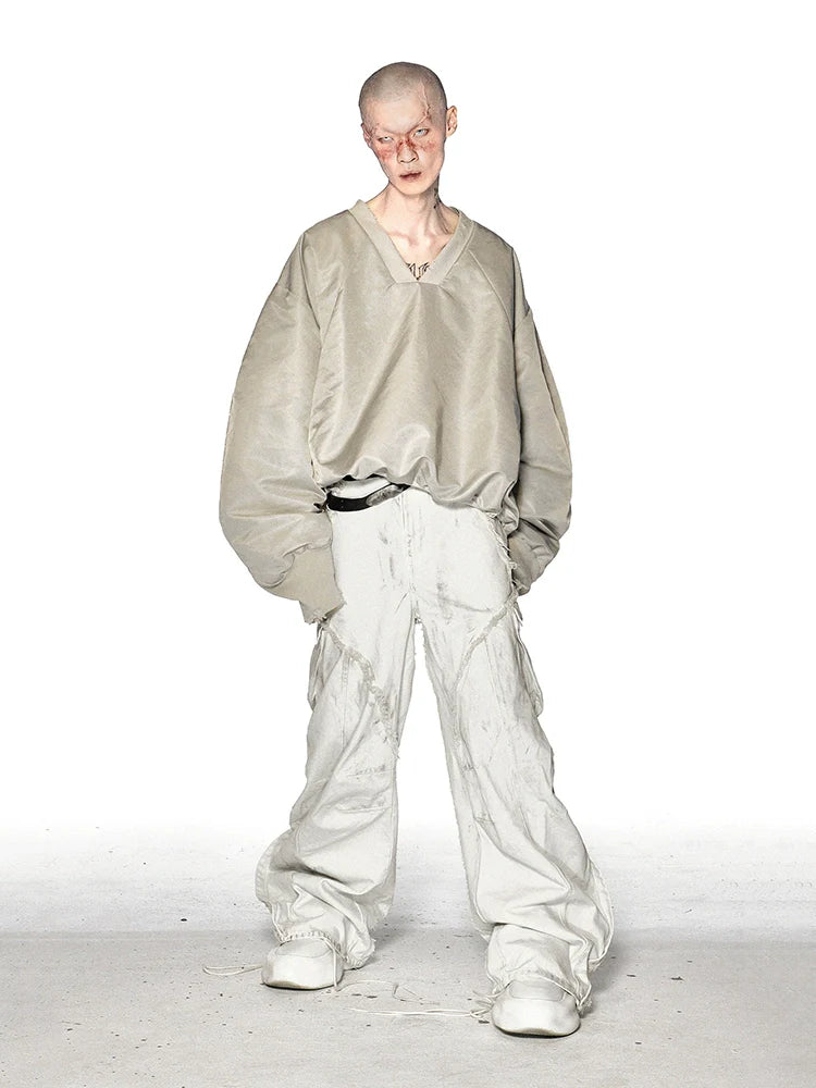 DEFORMED V-NECK TOP